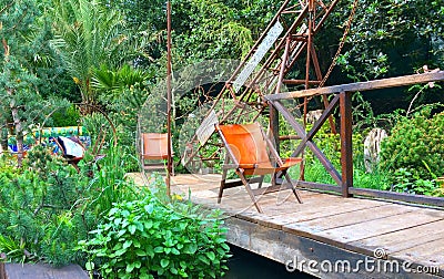 An artisan show garden at Chelsea Flower Show Editorial Stock Photo